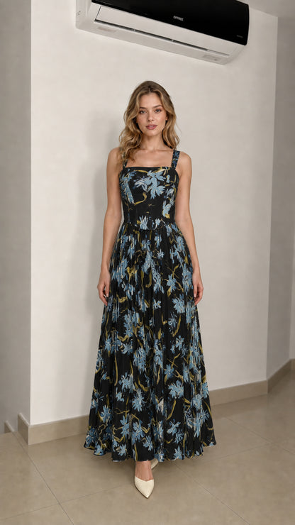 Model wearing black floral maxi dress