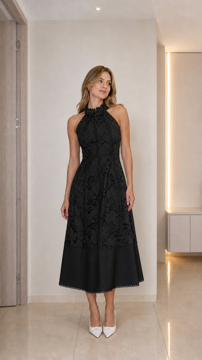 Model wearing black halter neck floral lace midi dress