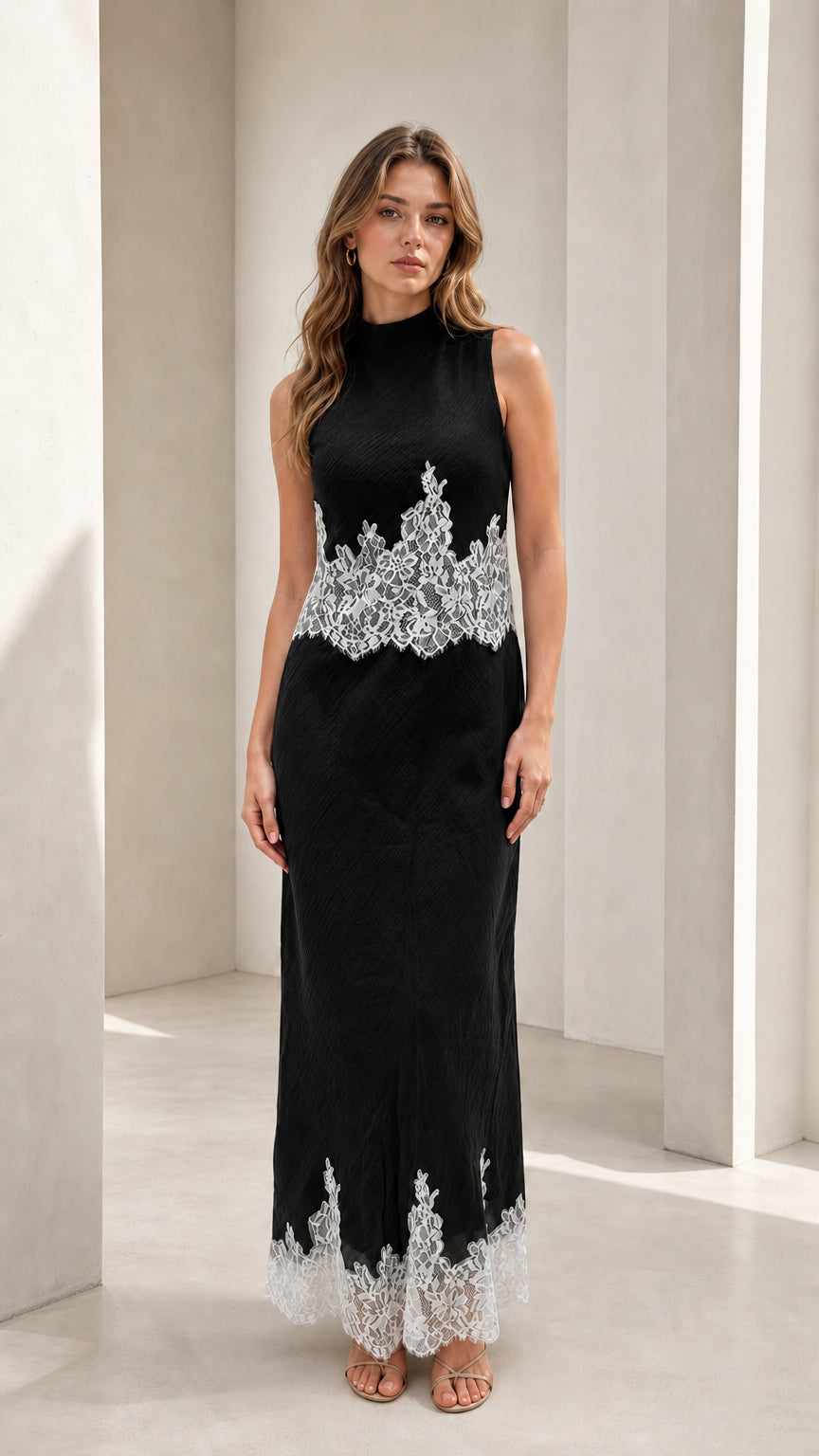 Model wearing black mock neck lace trim maxi dress