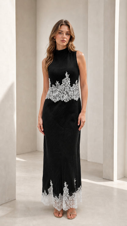 Model wearing black mock neck lace trim maxi dress