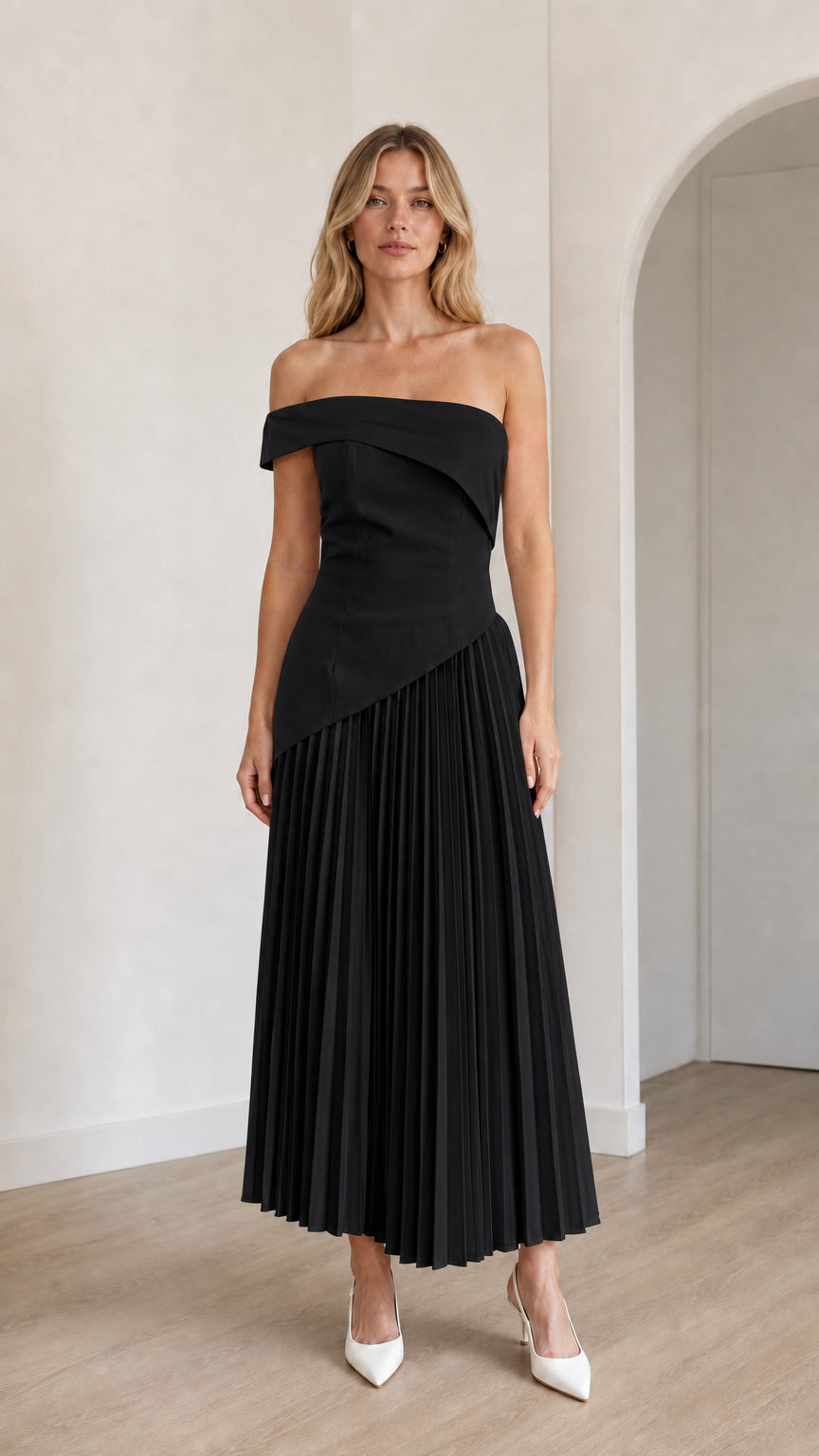 Model wearing black off-shoulder asymmetric pleated midi dress