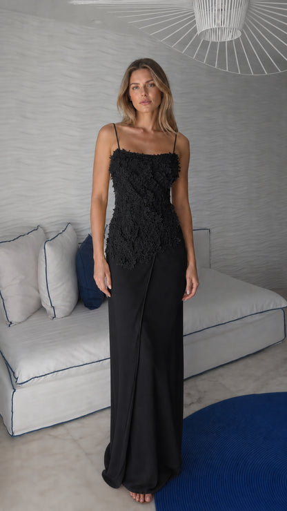 Front view of black floral applique maxi dress
