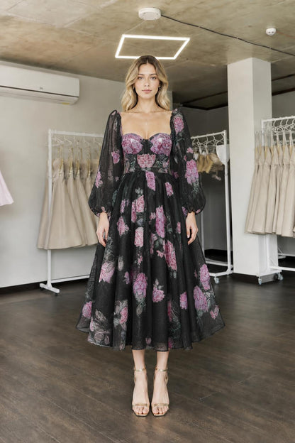 Front view of black floral midi dress