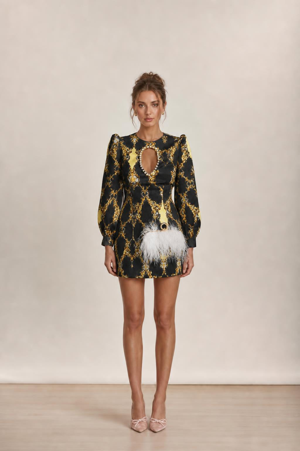 Model wearing black baroque print mini dress