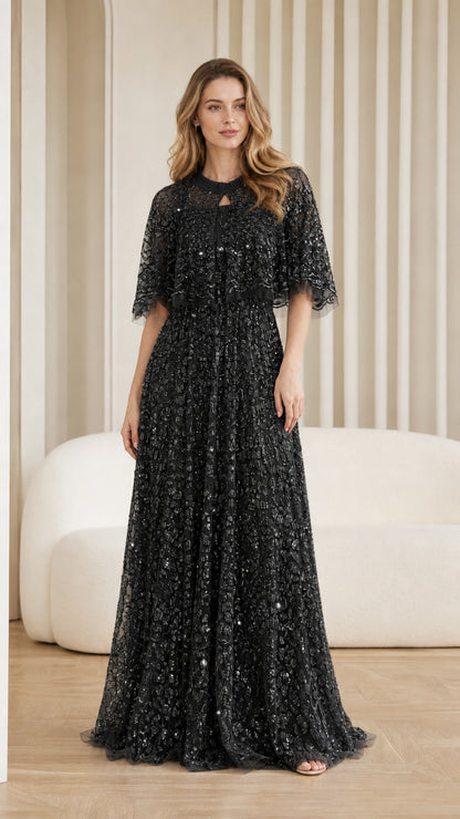 Front view of black sequin maxi dress