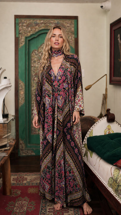 Model wearing black bohemian floral maxi dress
