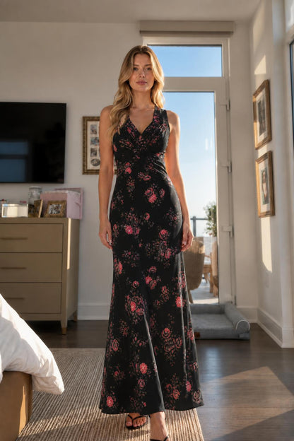 Front view of model wearing black floral V-neck maxi dress