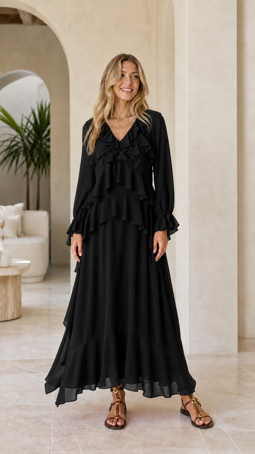 Model wearing black tiered ruffle long sleeve maxi dress