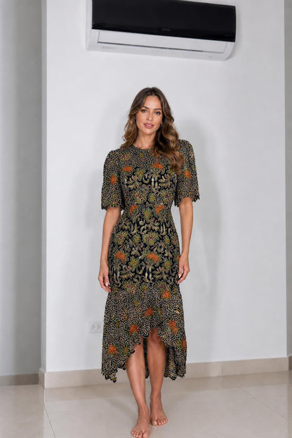 Front view of black floral lace midi dress