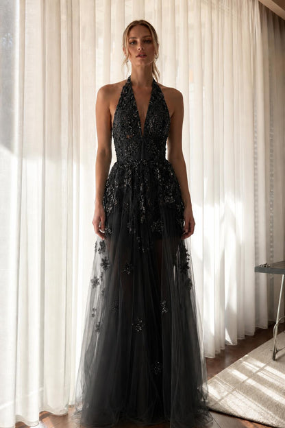 Front view of black embroidered halter evening dress