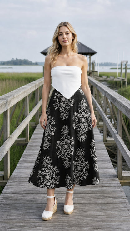 Front view of black floral midi skirt variant