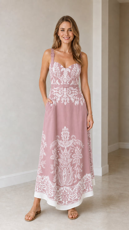 Model wearing pink botanical print maxi dress