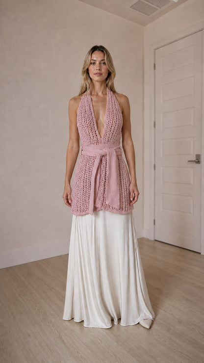 Front view of pink open knit halter top and maxi skirt set