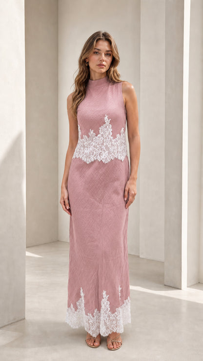 Model wearing pink mock neck lace trim maxi dress