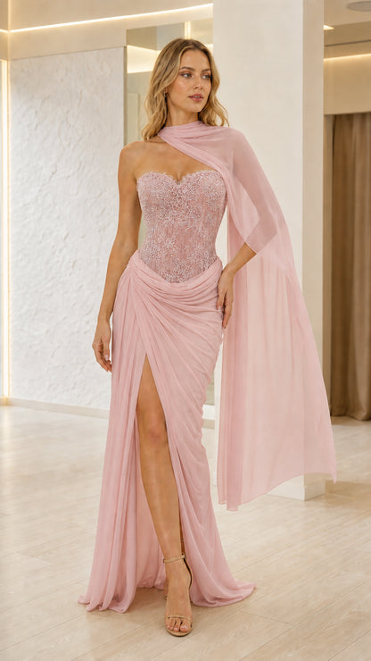 Blush pink lace corset maxi dress with one-shoulder sheer cape