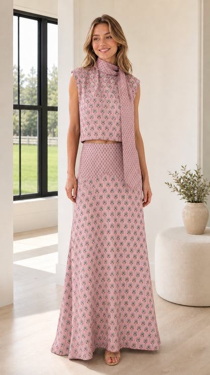 Front view of model wearing pink patterned two-piece set