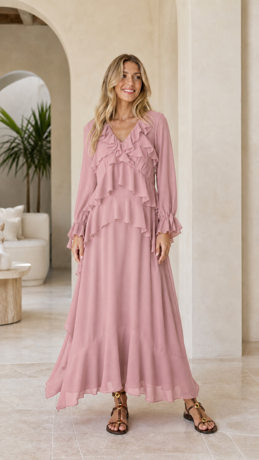 Model wearing pink tiered ruffle long sleeve maxi dress