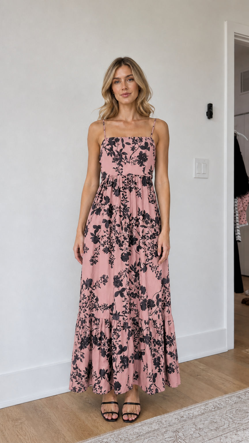 Model wearing pink floral maxi dress