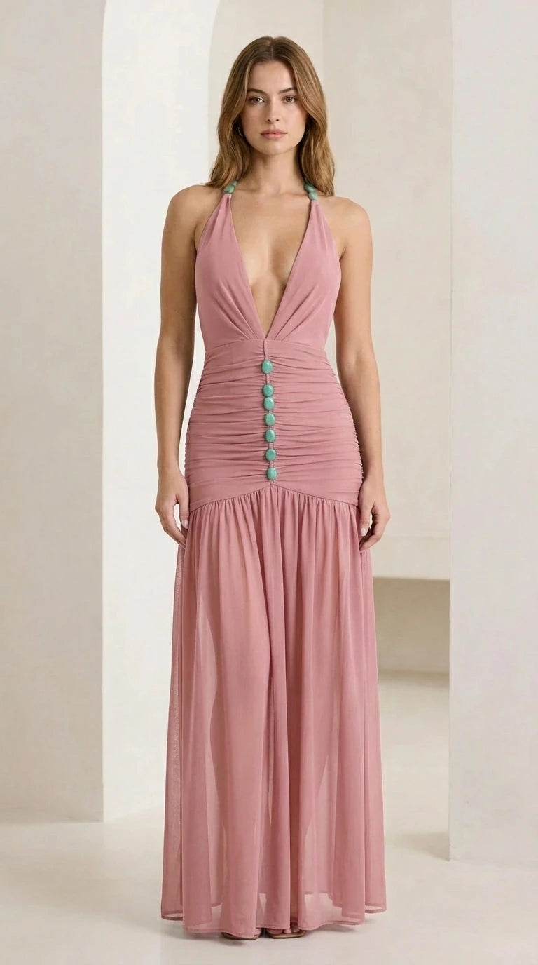 Front view of pink halter neck ruched maxi dress