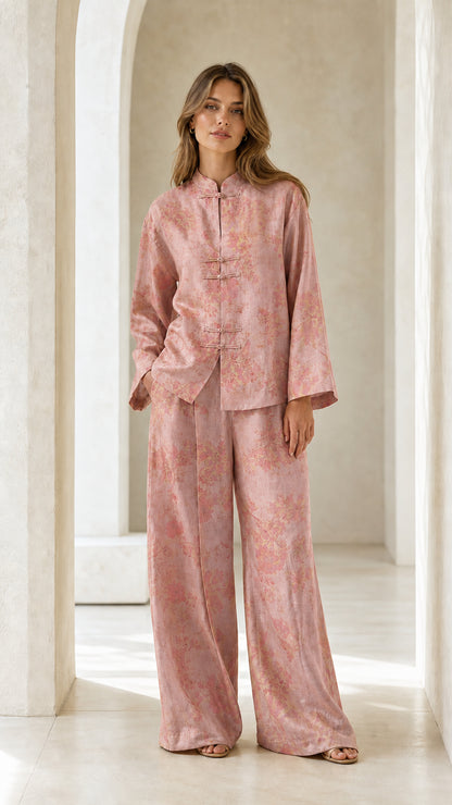 Front full view of woman wearing pink floral two-piece set
