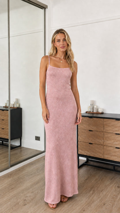 Model wearing pink sequin spaghetti strap maxi dress