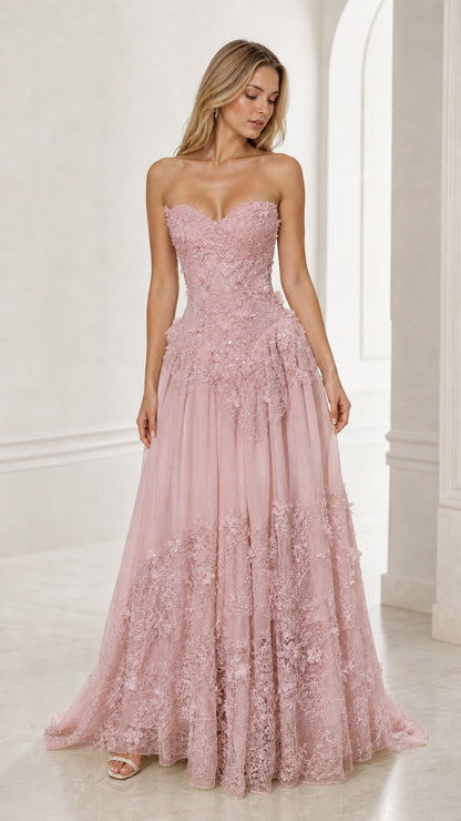 Front view of pink strapless floral applique ball gown