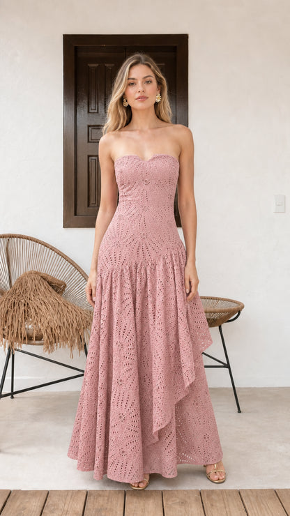 Model wearing pink strapless eyelet maxi dress