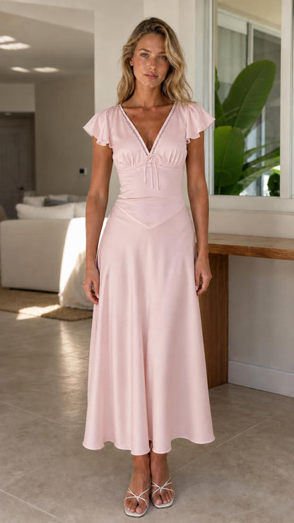 Front view of model wearing pink midi dress