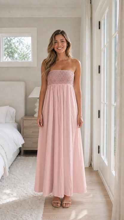 Full length view of woman wearing pink strapless maxi dress