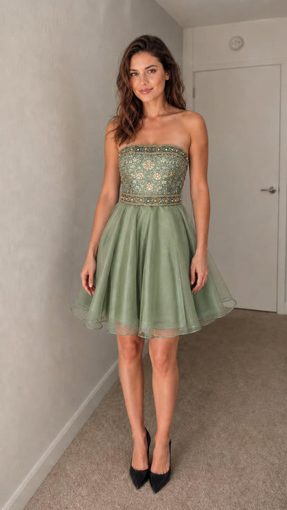 Front view of sage green strapless embroidered cocktail dress