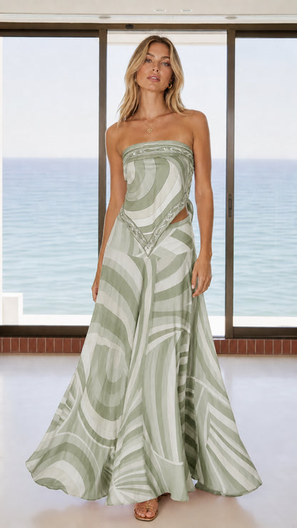 Front view of woman wearing sage green abstract swirl matching set