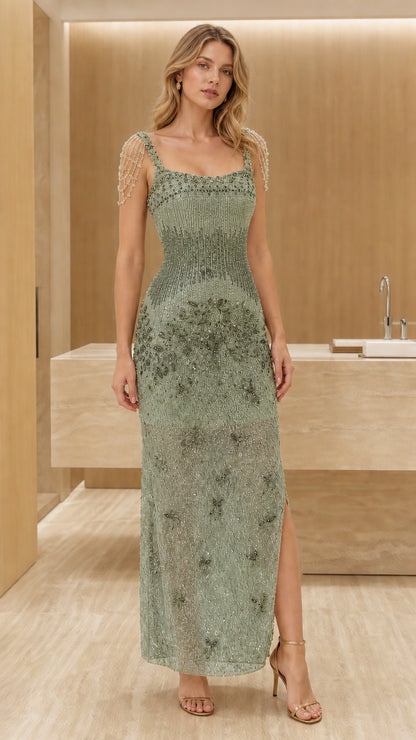 Front view of model wearing sage green beaded evening dress