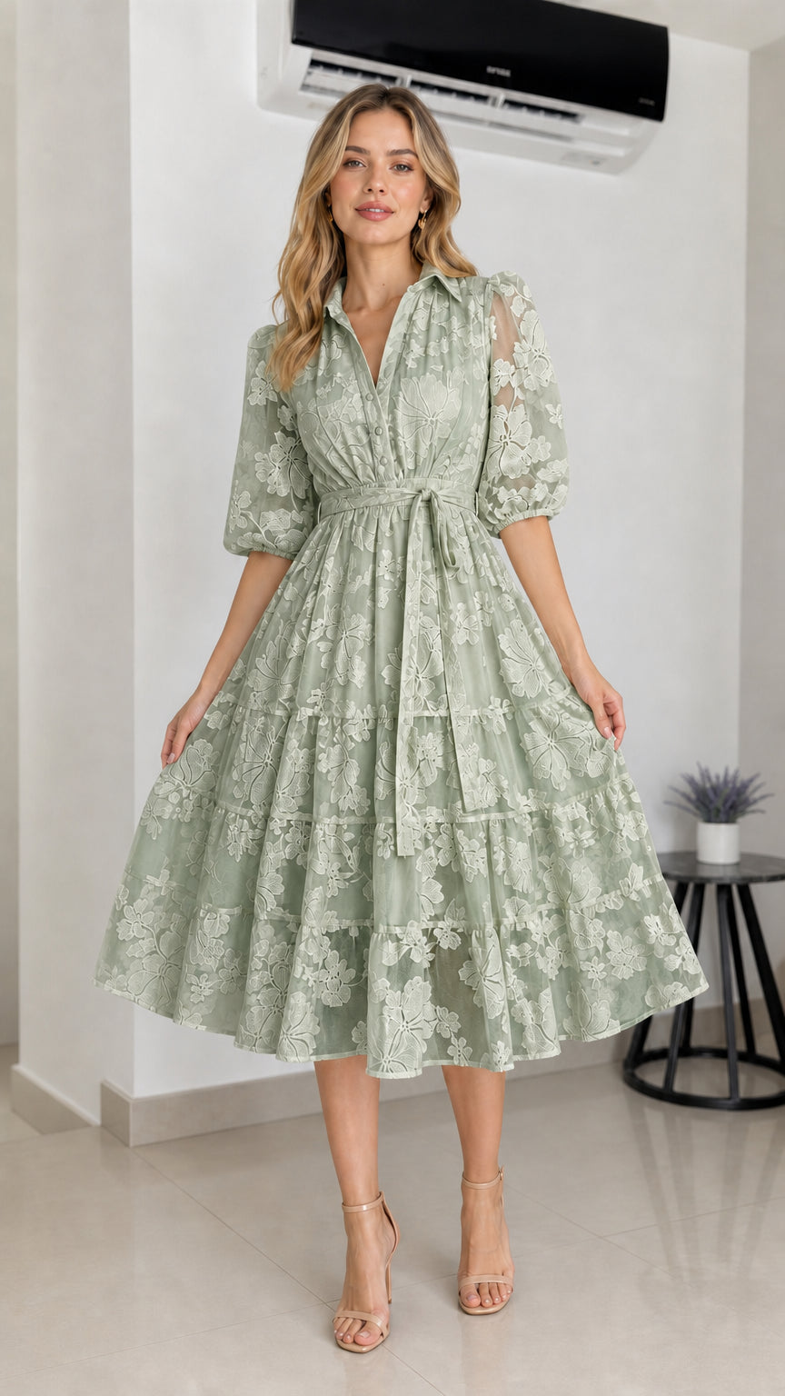Front view of sage green floral embroidered midi dress