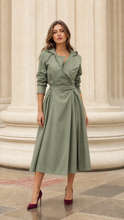 Front view of woman wearing sage green hooded trench dress