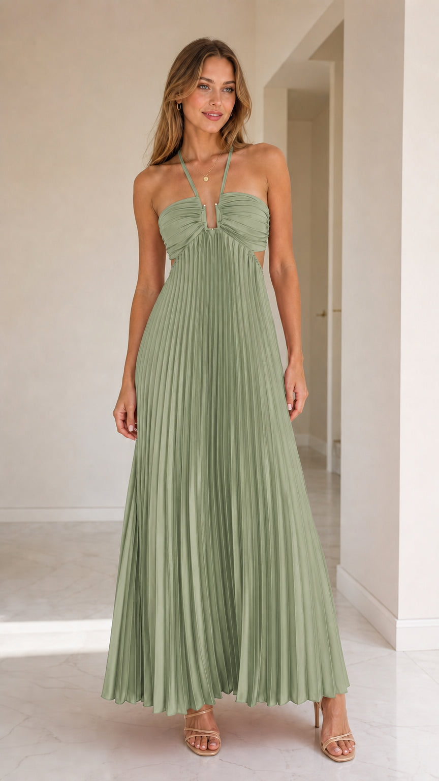 Model wearing sage green halter pleated maxi dress