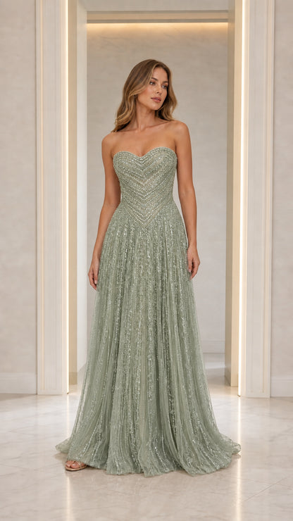 Front view of model in Sage strapless beaded gown