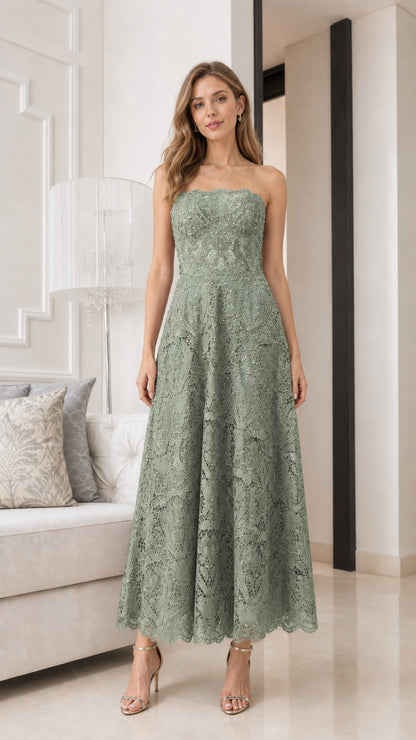 Front view of model wearing sage strapless lace midi dress
