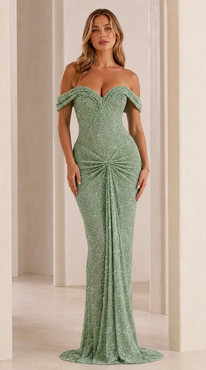 Model wearing sage green off-shoulder sequin evening gown