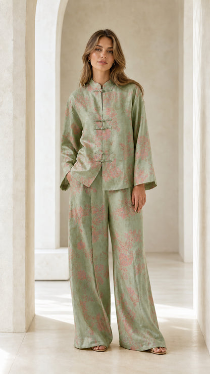 Front full view of woman wearing green floral two-piece set