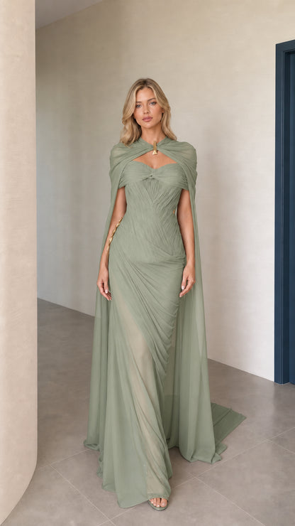 Front view of sage green cape maxi evening dress