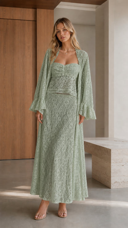 Front view of woman wearing sage green three-piece lace set