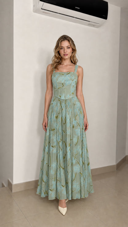 Model wearing sage floral maxi dress
