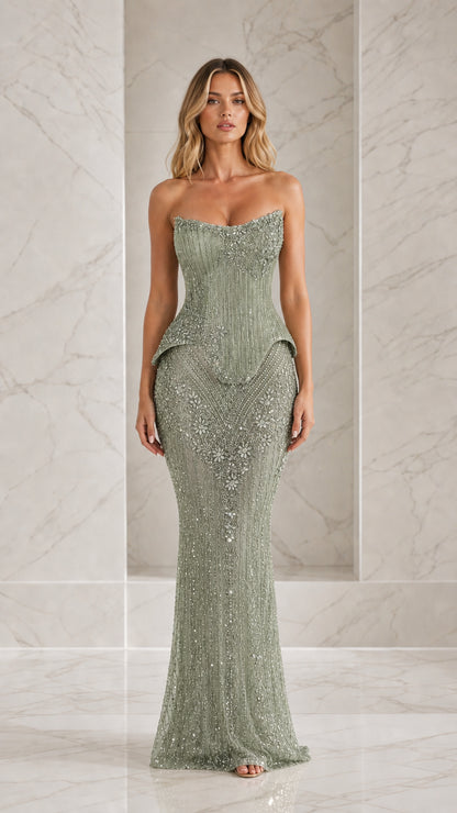 Front view of model wearing sage green beaded strapless evening gown