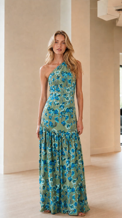 Front view of model wearing green floral one-shoulder maxi dress