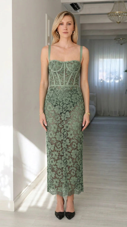 Front view of woman wearing sage lace corset midi dress