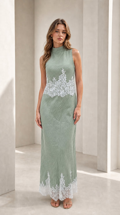 Model wearing sage mock neck lace trim maxi dress