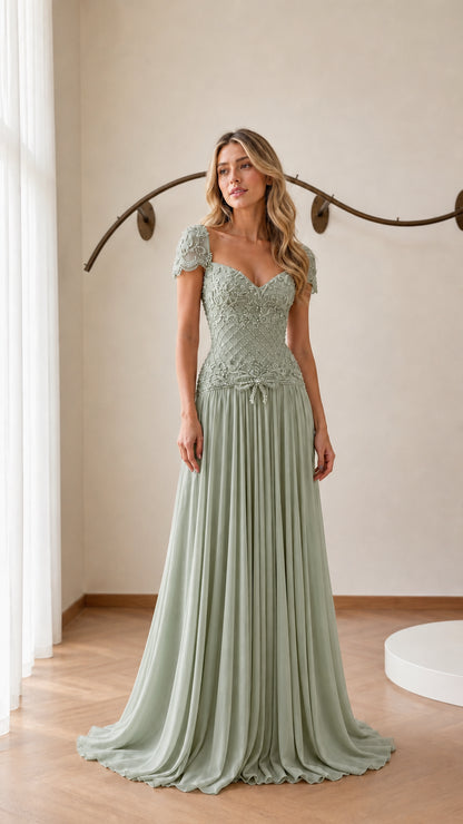 Front view of model wearing sage green evening gown