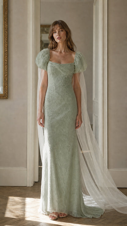 Front view of sage green lace maxi dress with cape