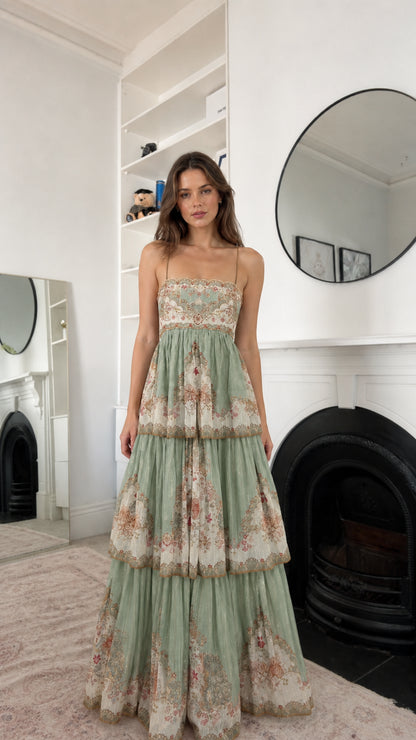 Sage green floral tiered maxi dress shown from the front
