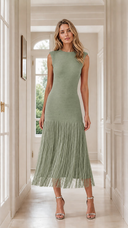 Front view of model wearing sage green color variant